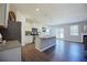 Modern, open kitchen with stainless steel appliances, granite countertops, and ample cabinet space at 4255 Sunflower Cir, Cumming, GA 30040