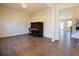 Inviting living room with views of the stairs, wood flooring and an antique piano at 4255 Sunflower Cir, Cumming, GA 30040