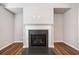 Close-up of the fireplace with a decorative mantle and dark firebox at 495 Duval Dr, Alpharetta, GA 30009