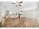 Open floor plan featuring spacious kitchen with an island overlooking the living area at 495 Duval Dr, Alpharetta, GA 30009