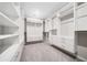 Large walk-in closet with custom built-in shelving and storage solutions at 495 Duval Dr, Alpharetta, GA 30009