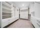 A large walk-in closet features custom shelving and storage at 495 Duval Dr, Alpharetta, GA 30009