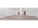 Comfortable bedroom with neutral carpet, white walls, and an open doorway to an adjacent room at 6123 Knickerbocker St, Mableton, GA 30127