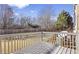Wooden deck and fenced backyard, providing a relaxing space for outdoor activities and gatherings at 1332 Adcox Sq, Stone Mountain, GA 30088