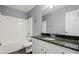 Bathroom with tub, granite counters, and vanity at 1332 Adcox Sq, Stone Mountain, GA 30088