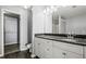 Bathroom featuring wood floors, granite countertop, and built in cabinets at 1332 Adcox Sq, Stone Mountain, GA 30088