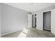 Neutral bedroom with plush carpet, closet, and simple decor at 1332 Adcox Sq, Stone Mountain, GA 30088