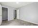 Bedroom with carpet, closet space, and neutral-toned walls at 1332 Adcox Sq, Stone Mountain, GA 30088