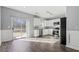 Bright eat-in kitchen with stainless steel appliances and access to a spacious outdoor deck at 1332 Adcox Sq, Stone Mountain, GA 30088