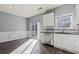 Functional kitchen area with stainless steel appliances and sliding glass door to back patio at 1332 Adcox Sq, Stone Mountain, GA 30088