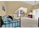 Spacious bedroom with high ceilings, carpeted floors, and natural light at 283 Heron Lake Ct, Lawrenceville, GA 30043