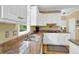 Close up of the kitchen, which features granite countertops and ample storage space at 283 Heron Lake Ct, Lawrenceville, GA 30043