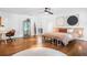 Bright bedroom features hardwood floors, ceiling fan, and stylish furniture at 4411 Paces Battle Nw, Atlanta, GA 30327