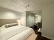 Cozy bedroom features a queen bed, a mirrored closet, and recessed lighting for a serene retreat at 4411 Paces Battle Nw, Atlanta, GA 30327