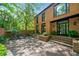 Stately brick home with a well-manicured front yard and steps leading to a double-door entrance at 4411 Paces Battle Nw, Atlanta, GA 30327