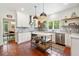 Spacious kitchen with marble countertops, stainless steel appliances, and terracotta tile flooring at 4411 Paces Battle Nw, Atlanta, GA 30327
