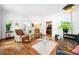 Inviting living room with hardwood floors, stylish seating, and bright, natural light at 4411 Paces Battle Nw, Atlanta, GA 30327