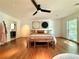 Bright main bedroom with hardwood floors and large windows showcasing the natural light and airy space at 4411 Paces Battle Nw, Atlanta, GA 30327