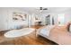 Spacious main bedroom featuring a sitting area, hardwood floors and natural light at 4411 Paces Battle Nw, Atlanta, GA 30327