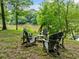 Scenic river view with seating area under mature trees; perfect for relaxing and enjoying nature's beauty at 4411 Paces Battle Nw, Atlanta, GA 30327