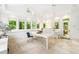 Bright sun room featuring many windows, tile floor and a door to the outside at 4411 Paces Battle Nw, Atlanta, GA 30327
