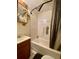 Bathroom with shower-tub combination, updated fixtures, and vanity at 505 Sandhill Hickory Level Rd, Carrollton, GA 30116