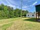 The property has spacious yard and the auxiliary unit has convenient covered parking at 505 Sandhill Hickory Level Rd, Carrollton, GA 30116