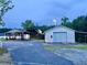 Property featuring primary house, carport, and detached garage on a generous lot at 505 Sandhill Hickory Level Rd, Carrollton, GA 30116