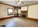 Cozy living room with fireplace, wood accents, and new flooring at 505 Sandhill Hickory Level Rd, Carrollton, GA 30116