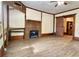Living room features include custom fireplace and sliding barn door at 505 Sandhill Hickory Level Rd, Carrollton, GA 30116