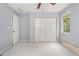 A bright bedroom with a ceiling fan and window that provides natural light ready for your personal touches at 1576 King Mill Rd, Mcdonough, GA 30252