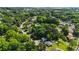 Aerial view of a neighborhood with mature trees and various rooftops at 1888 Goddard Se St, Atlanta, GA 30315