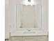Bathroom featuring white countertops and cabinets and a large, frameless mirror at 1888 Goddard Se St, Atlanta, GA 30315