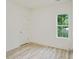 This bright bedroom has a large window offering great lighting and a cozy feel at 1888 Goddard Se St, Atlanta, GA 30315