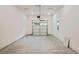A spacious, clean garage featuring a gray sealed concrete floor and a well-lit overhead door at 1888 Goddard Se St, Atlanta, GA 30315