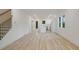 Wide shot of empty living room showing a view of the kitchen and lots of natural light at 1888 Goddard Se St, Atlanta, GA 30315
