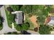 Charming single-Gathering home with a well-maintained lawn and mature trees in a quiet neighborhood at 235 Foxley Way, Roswell, GA 30075