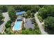 Aerial view of community pool, clubhouse, tennis court and parking areas at 235 Foxley Way, Roswell, GA 30075