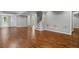 Large finished basement with hardwood floors, a walkout door, and recessed lighting at 235 Foxley Way, Roswell, GA 30075