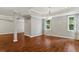 Finished basement area with hardwood flooring, recessed lighting, and natural light at 235 Foxley Way, Roswell, GA 30075