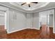 Finished basement area with hardwood flooring, recessed lighting and access to a wet bar at 235 Foxley Way, Roswell, GA 30075