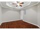 Finished basement with hardwood floors, recessed lighting, and a ceiling fan at 235 Foxley Way, Roswell, GA 30075