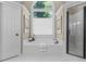 Bright bathroom with a soaking tub under a window and a glass enclosed shower at 235 Foxley Way, Roswell, GA 30075