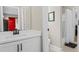 Neat bathroom featuring a modern vanity with black hardware and a shower with curtain at 235 Foxley Way, Roswell, GA 30075