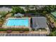 Overhead view of a sparkling community pool with lounge chairs and a covered gazebo area at 235 Foxley Way, Roswell, GA 30075