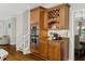 Gourmet kitchen with stainless steel appliances, granite countertops, and ample cabinet space at 235 Foxley Way, Roswell, GA 30075