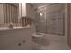 Cozy bathroom with shower/tub combo, vanity and neutral color scheme at 4137 Wellington Hills Ln, Snellville, GA 30039