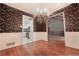 Elegant dining area showcases open design and stylish chandelier at 4137 Wellington Hills Ln, Snellville, GA 30039