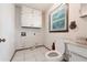 Laundry room with cabinet storage and window for natural light at 4137 Wellington Hills Ln, Snellville, GA 30039