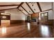 Spacious living area with hardwood floors and a classic fireplace, perfect for entertaining and relaxation at 4137 Wellington Hills Ln, Snellville, GA 30039